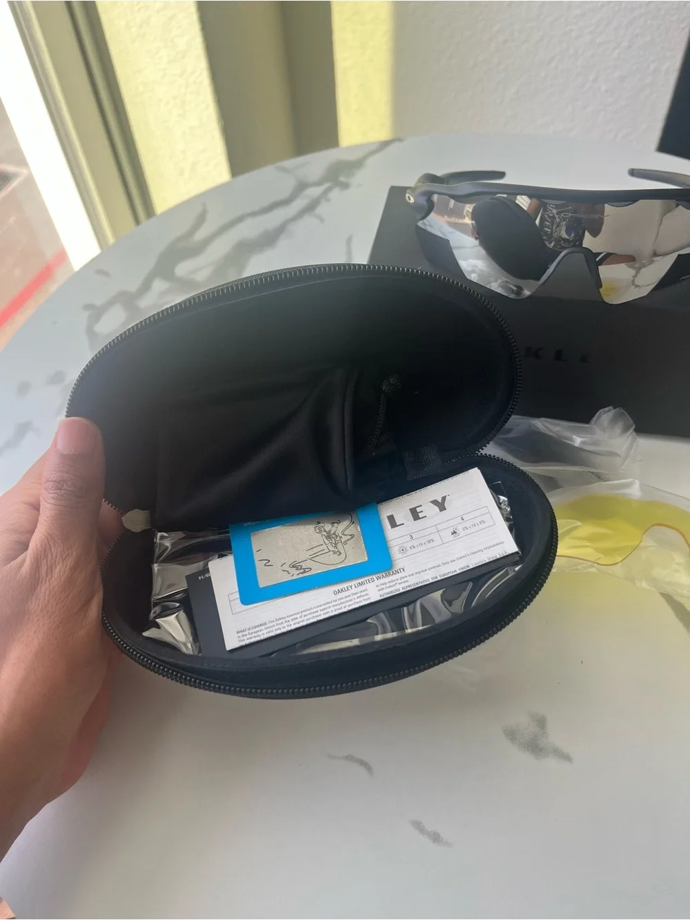 Oakley Black Frame Sunglasses with Silver Mirror Lens